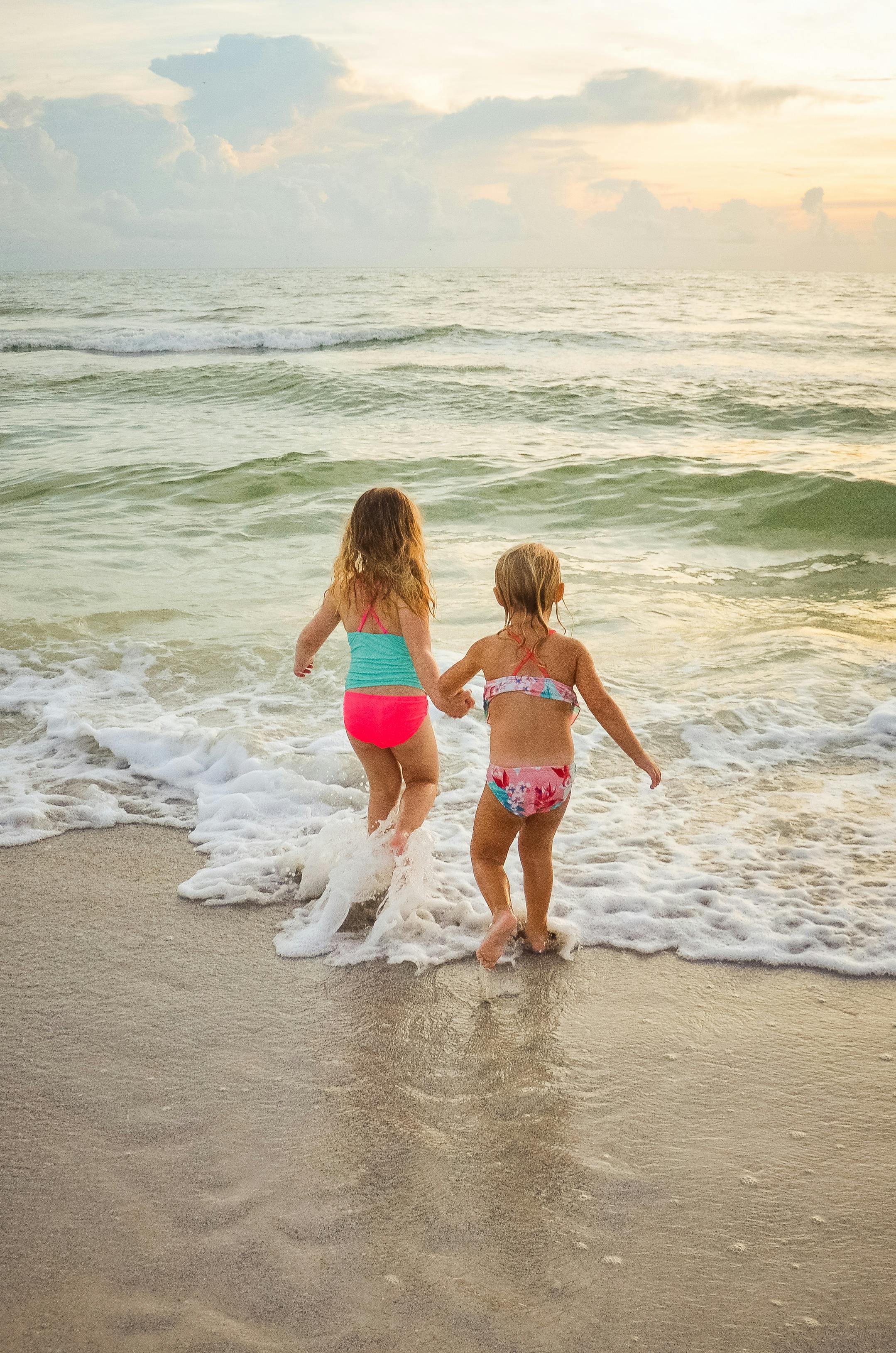 two little girls holding hands