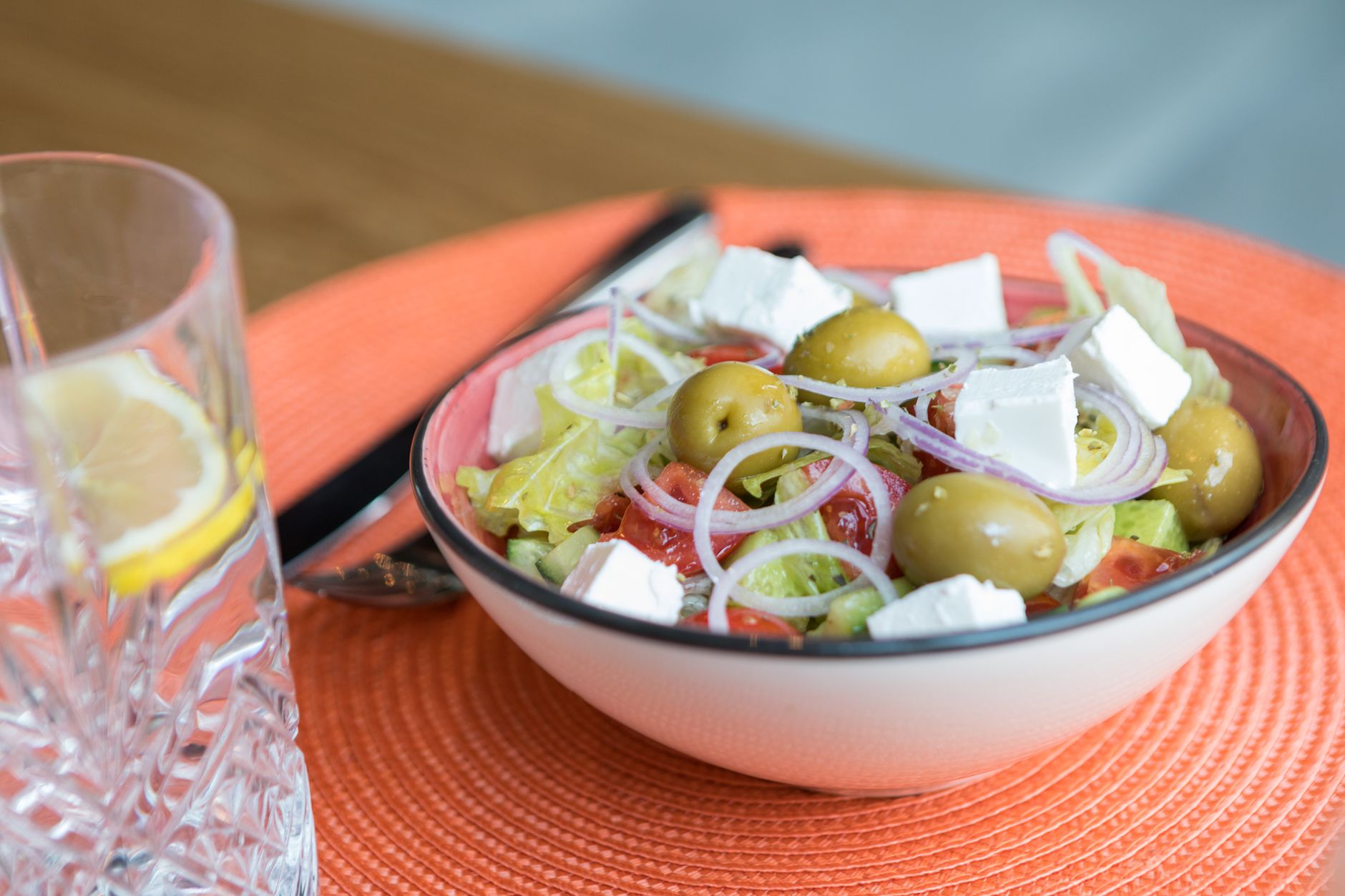 Close up of marinated Greek olives with herbs