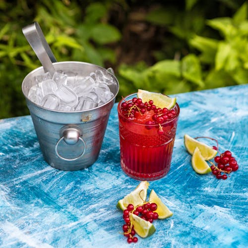 Cranberry Juice With Lime On Clear Glass