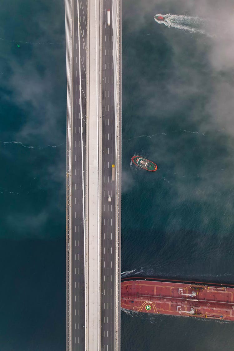 Ships In Water Under Bridge