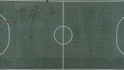 Aerial View of People Playing Football