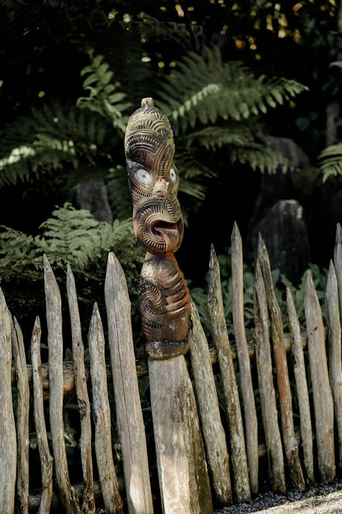 Wood Carving on a Wooden Fence