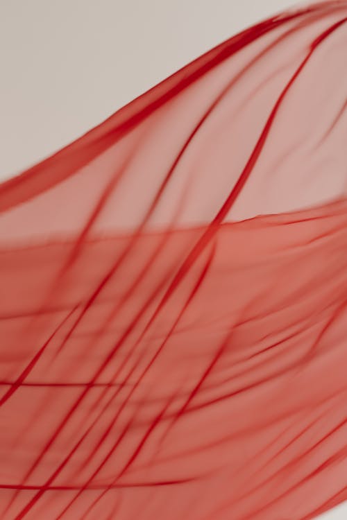 Close-Up Shot of a Red Textile