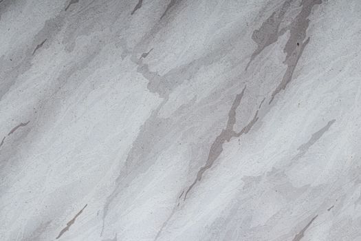 High-quality gray marble texture with natural patterns, ideal for backgrounds or design projects.