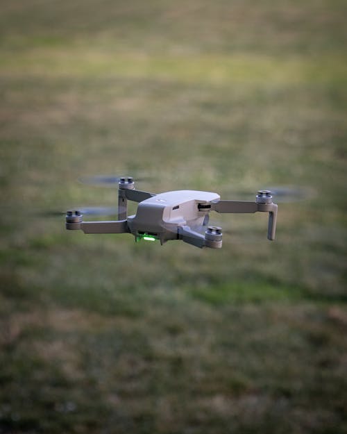Free White Drone Flying Stock Photo