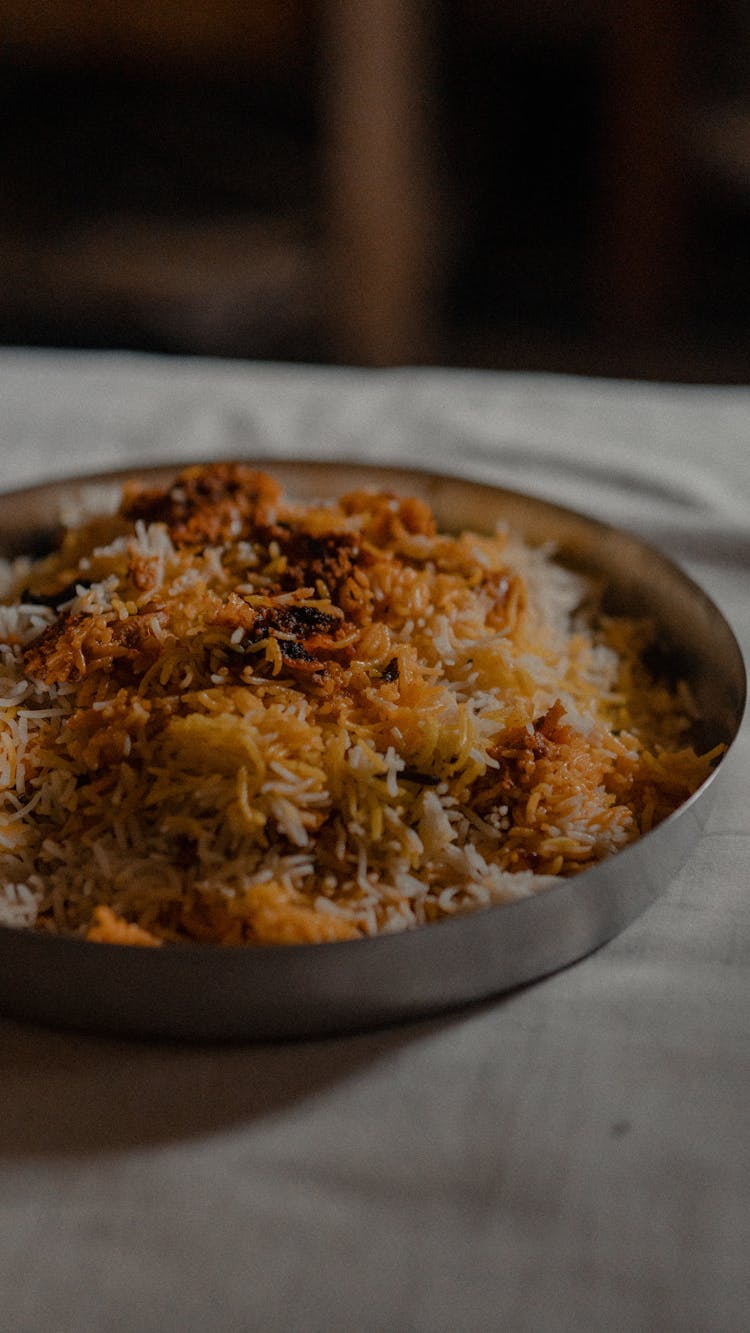 Cooked Food On Stainless Steel Plate