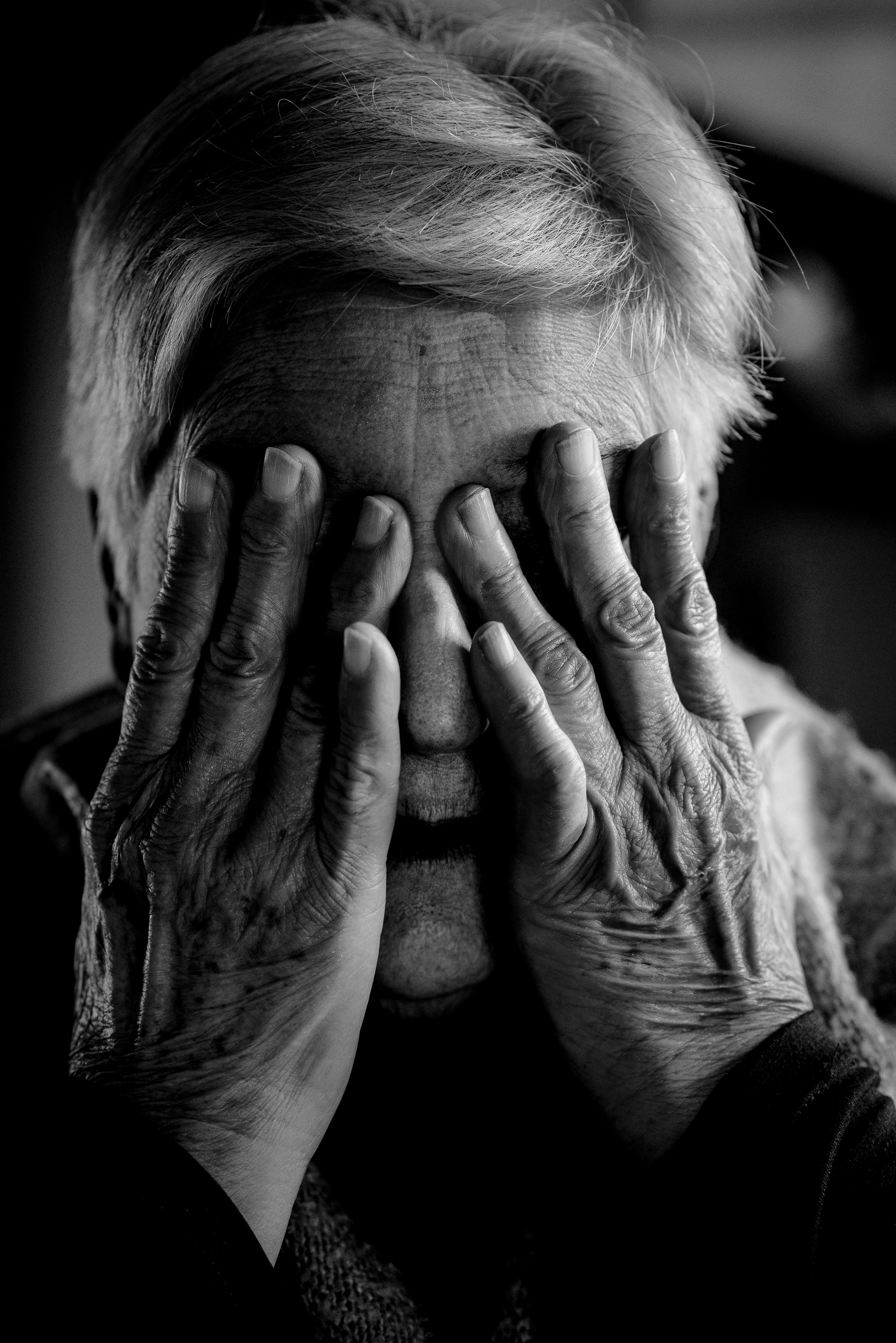 Elderly Woman Covering Her Face With Her Hands · Free Stock Photo