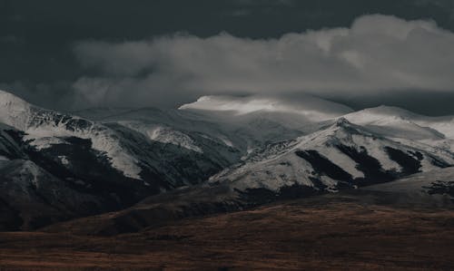 Photo of Snow Covered Mountains