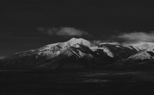  Snow Covered Mountain in Grayscale Photography