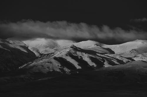 Free Grayscale Photography of Mountain Range Stock Photo