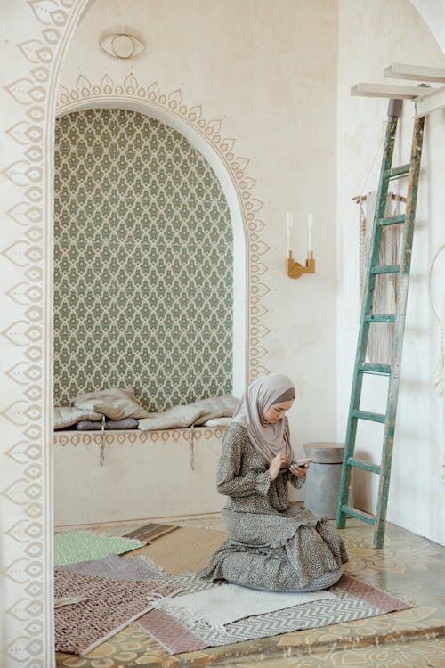 Woman Wearing Hijab Using Smartphone