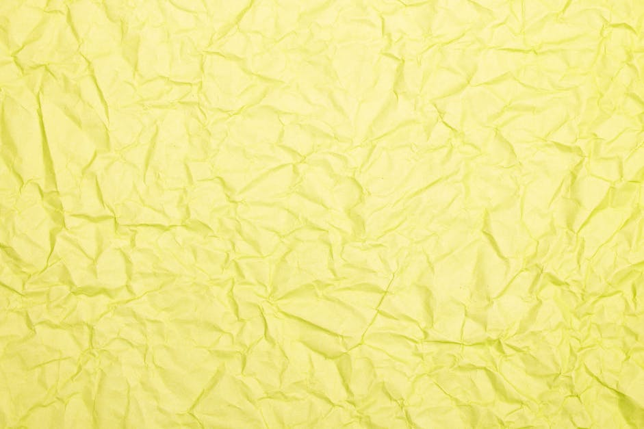 Crumpled Blank Yellow Paper · Free Stock Photo