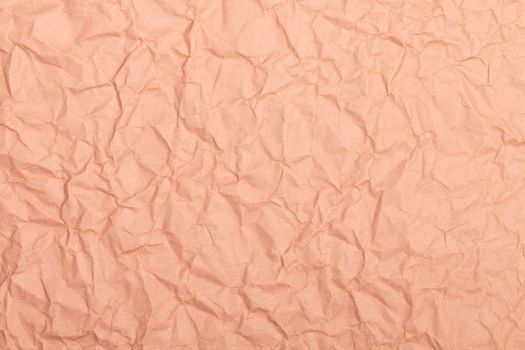 Abstract image of crumpled brown paper, perfect for background or texture use.
