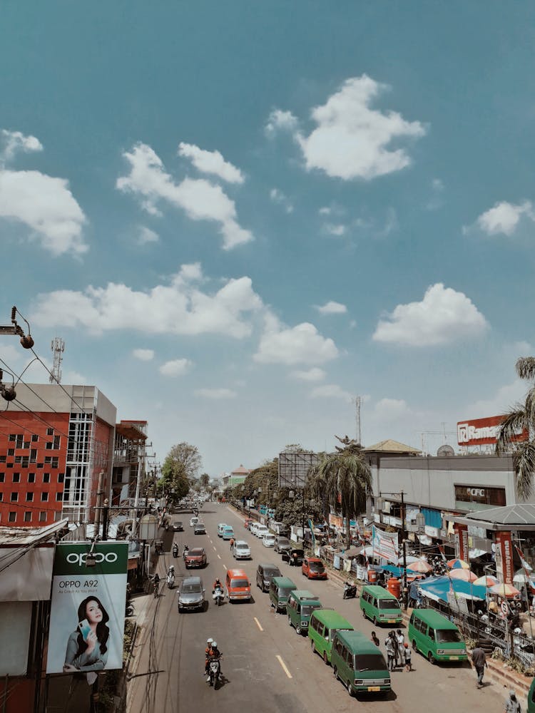 Cars On Street Of Poor Tropical City