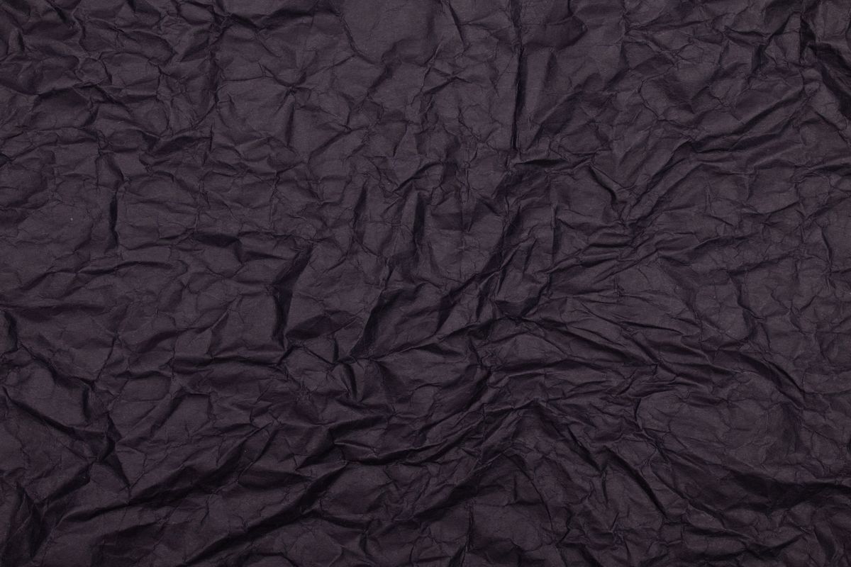 Deep indigo crumpled handmade paper — photo by Tamanna Rumee on Pexels