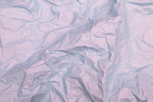 Free High-resolution image showcasing a wrinkled pink paper texture, perfect for backgrounds and design projects. Stock Photo