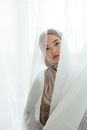 A Woman in Brown Hijab