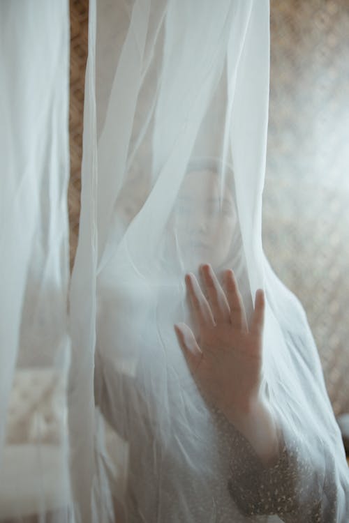 Woman Behind Silk Fabric
