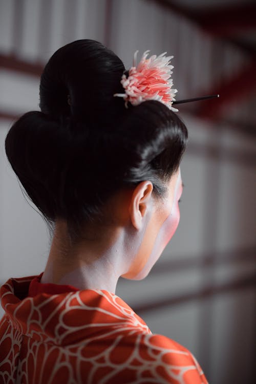 Brunette Woman Hairstyle with Flower