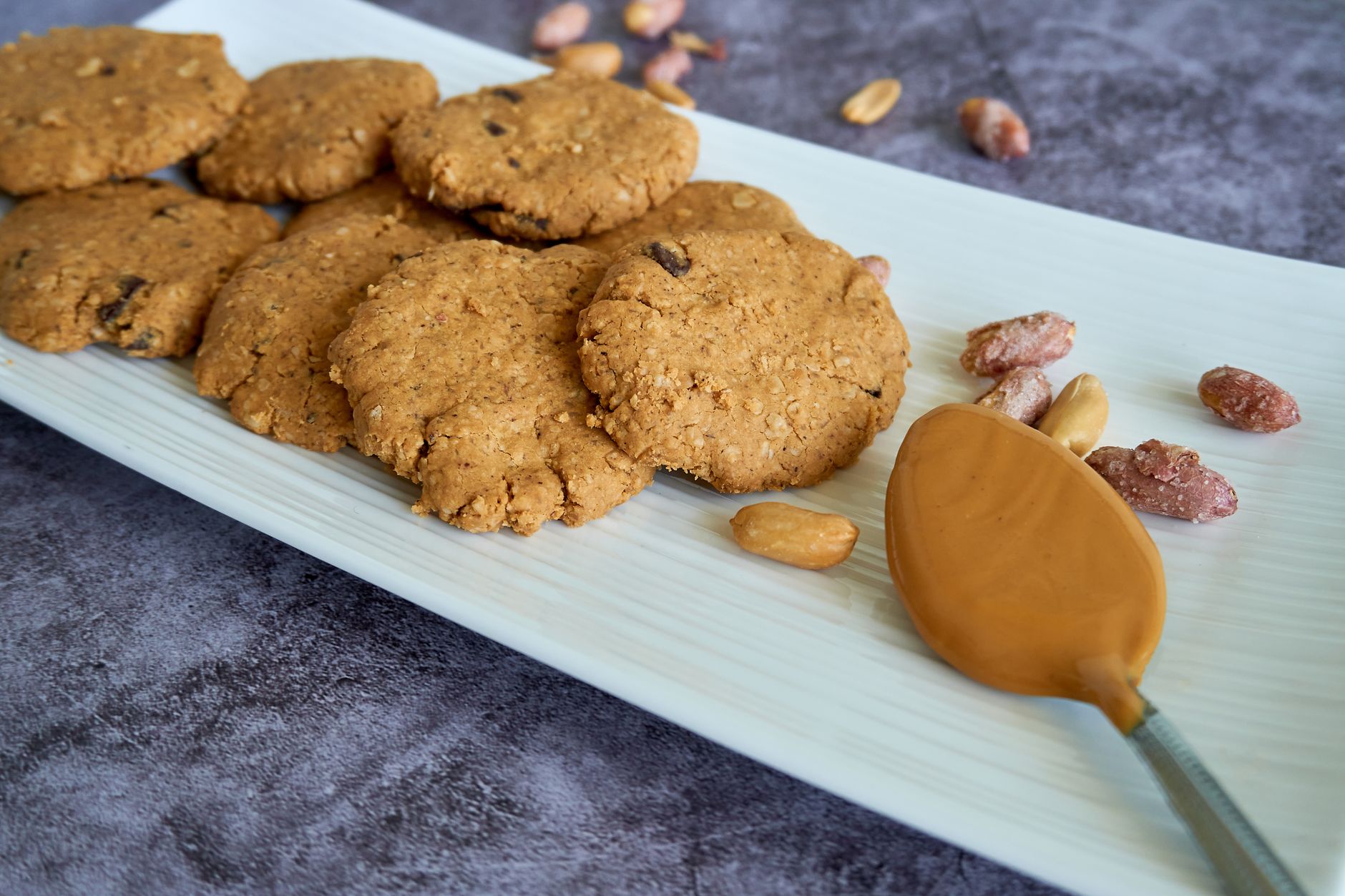 Mixing peanut butter cookie dough in a bowl
