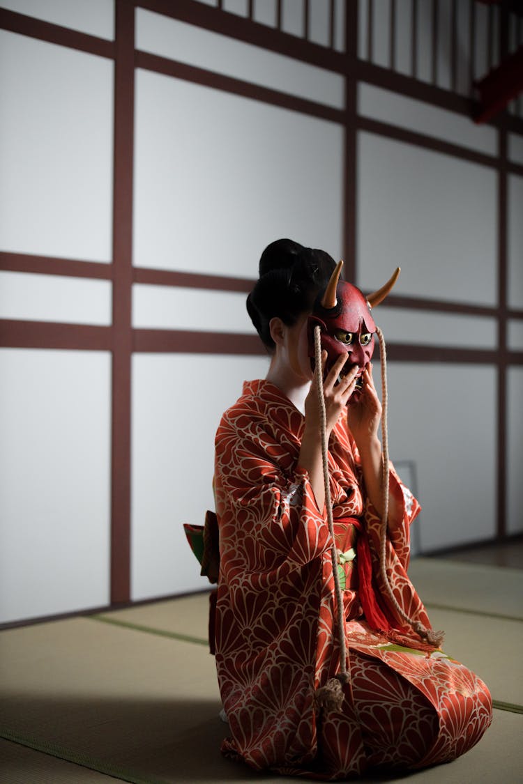 A Woman Wearing A Kimono 