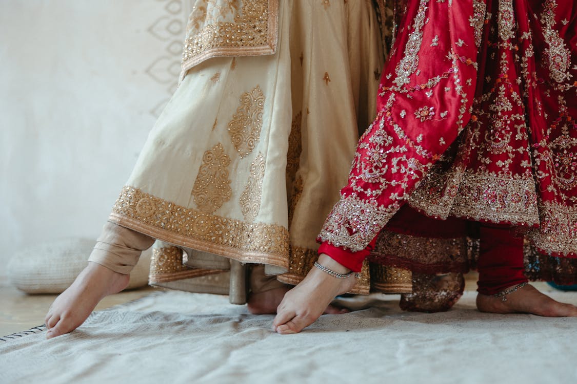 Feet of Women in Dresses · Free Stock Photo