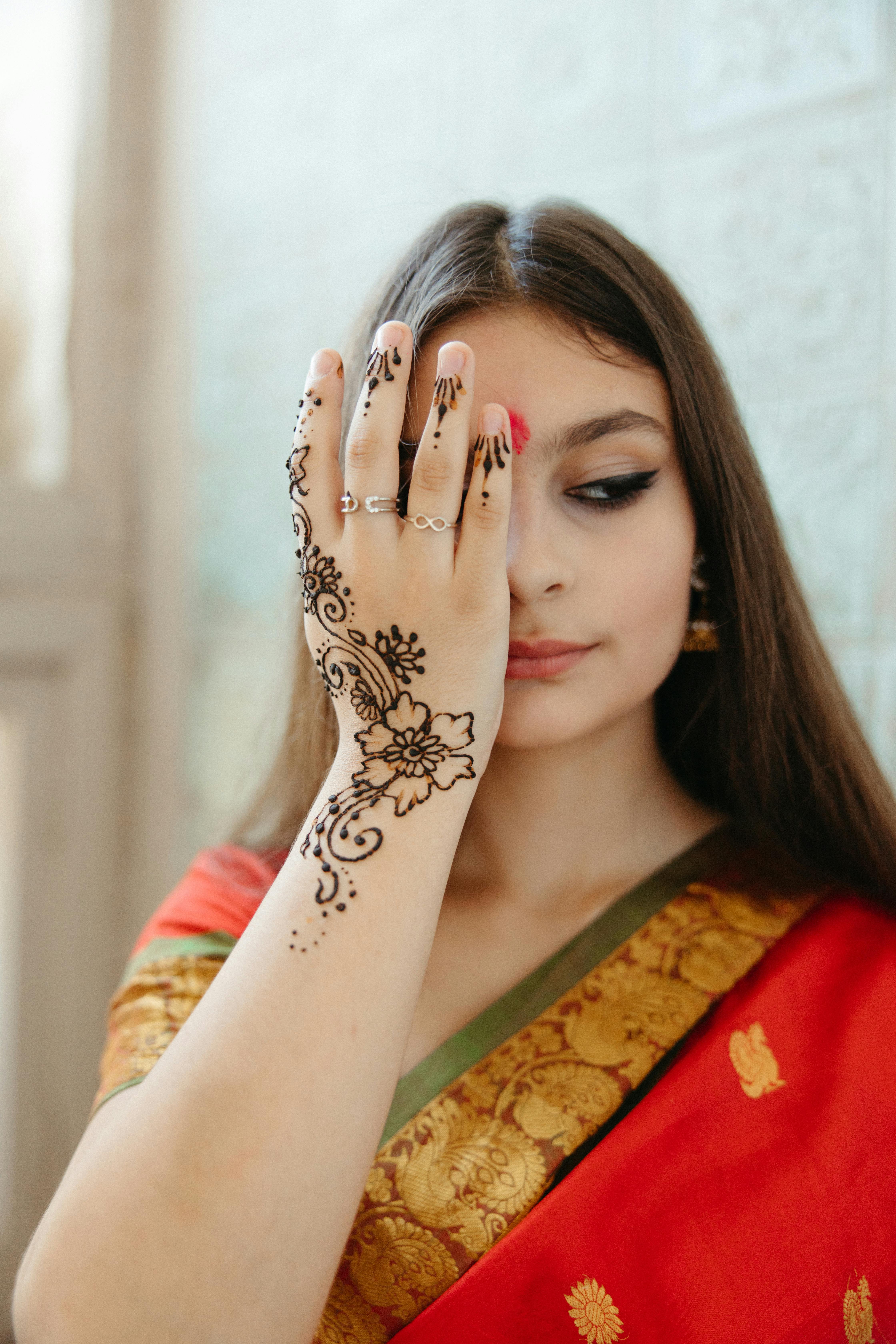 Womans hand with mehndi tattoo Hand of Indian bride with black henna  tattoos Stock Photo Picture And Low Budget Royalty Free Image Pic  ESY024803923  agefotostock