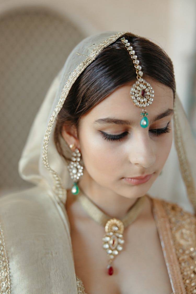 A Beautiful Woman Wearing Maang Tikka