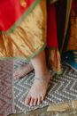 A Woman in Sari Wearing Anklets