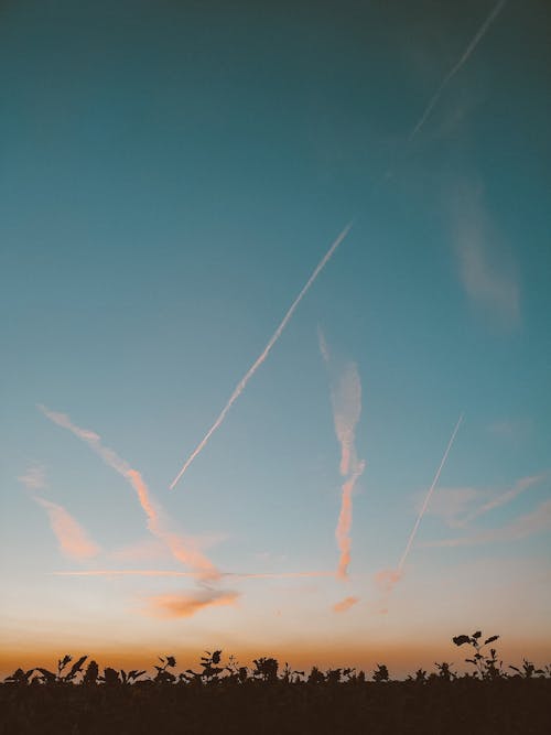 Free Smoke Trail on Blue Sky Stock Photo