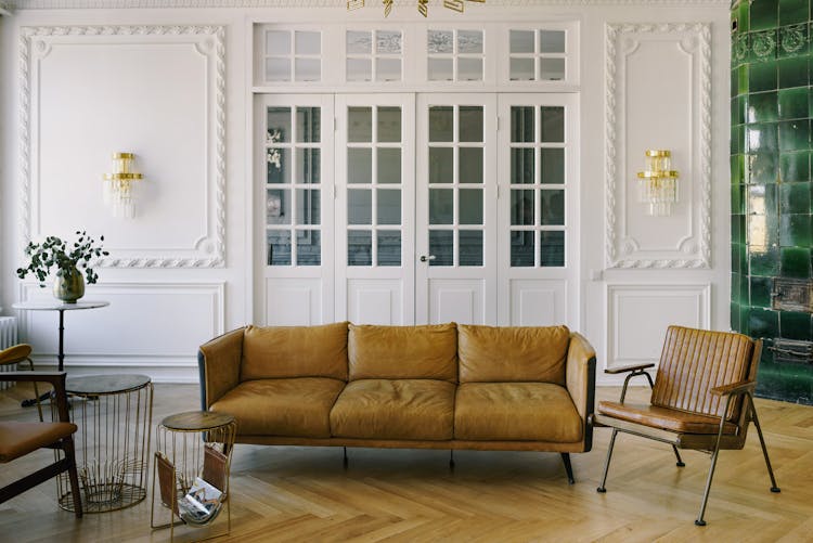 Couch And Armchairs With Leather Cushions