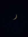 Crescent moon on black dark sky