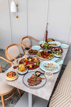 Luxurious dining setup featuring gourmet dishes and elegant tableware, perfect for upscale dining experiences.