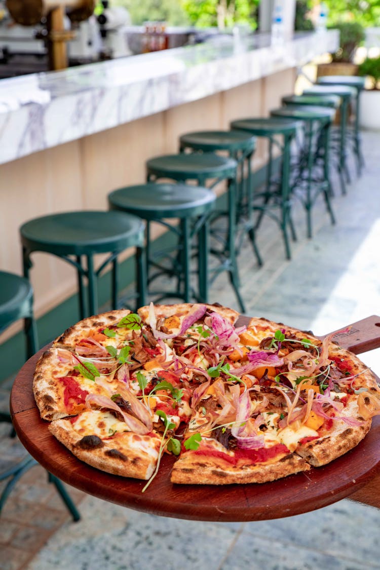 Pizza On Wooden Board