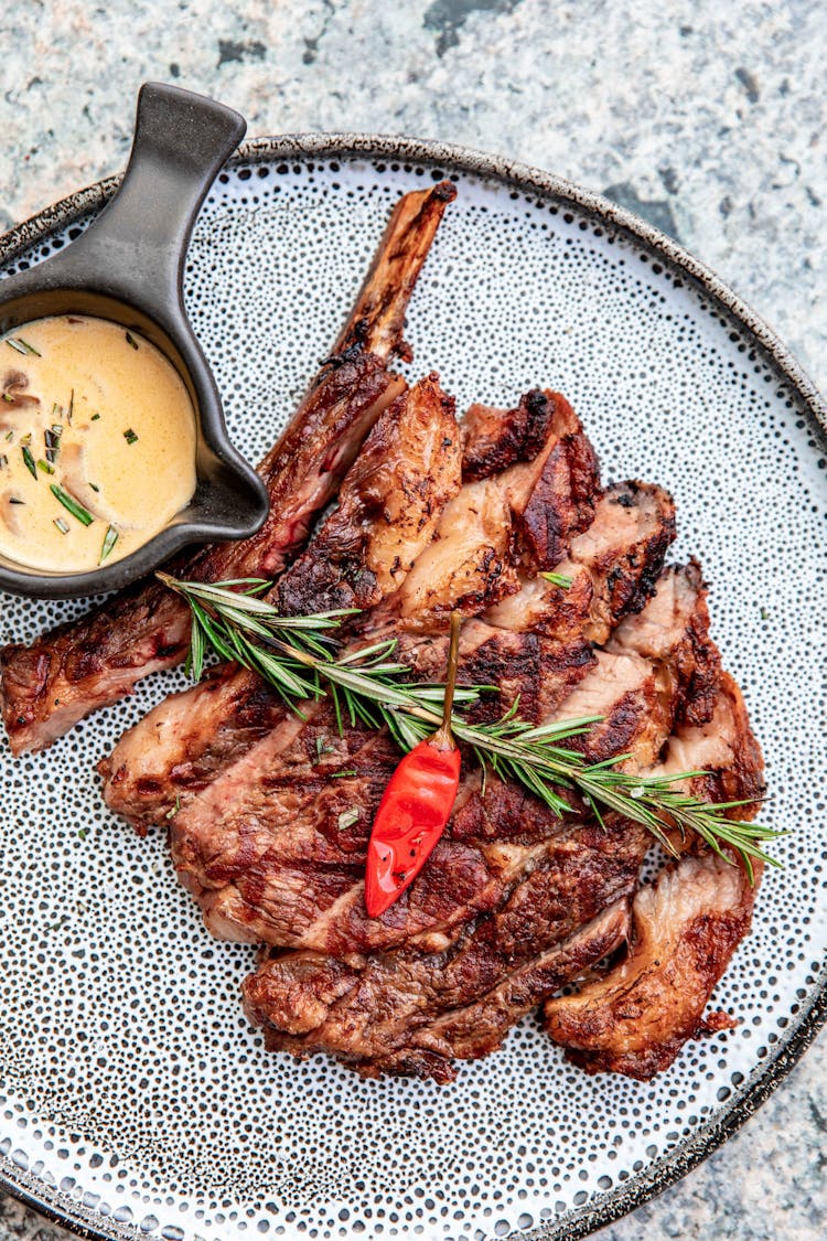 Grilled Steak On A Ceramic Plate