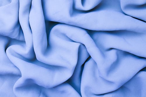 Blue Fabric in Close-up Photography