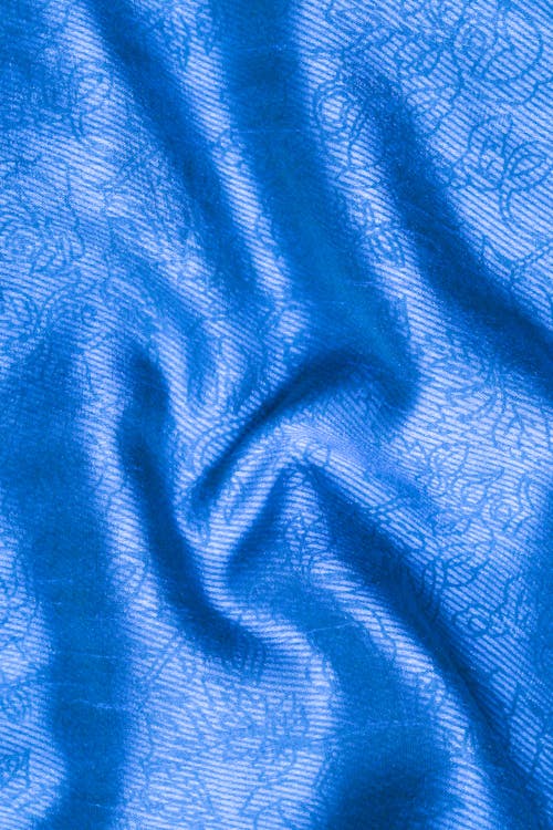 Creases on Blue Fabric