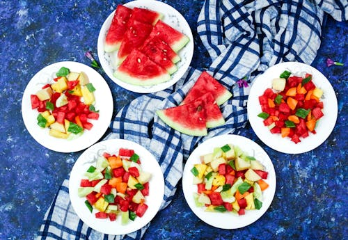 Fresh Fruit Slices on Plates