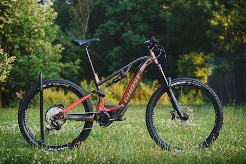 A Ghost Mountain Bike Parked on the Grass