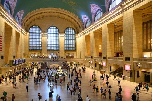 Free A lively view of commuters in New York's Grand Central Terminal, showcasing its historic architecture. Stock Photo