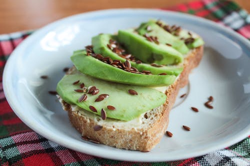 Free Avocado Toast in Ceramic Plate  Stock Photo