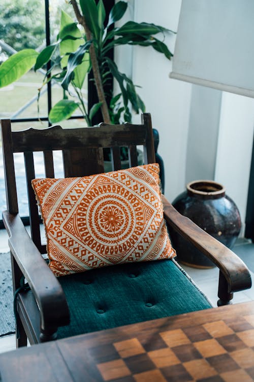 A Pillow on a Wooden Armchair