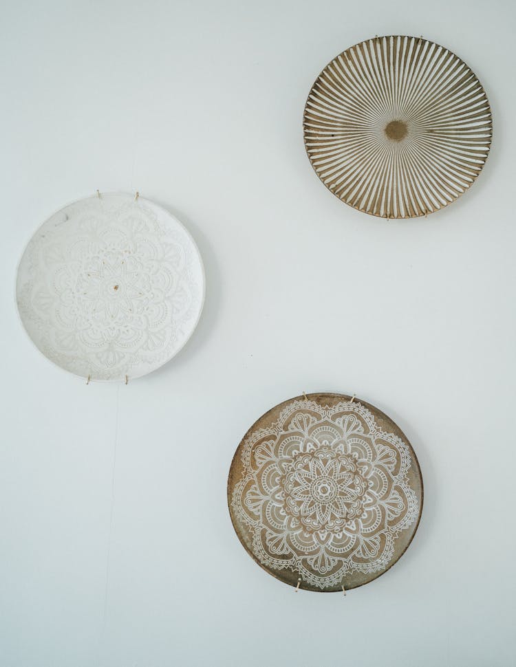 Decorative Plates On White Wall