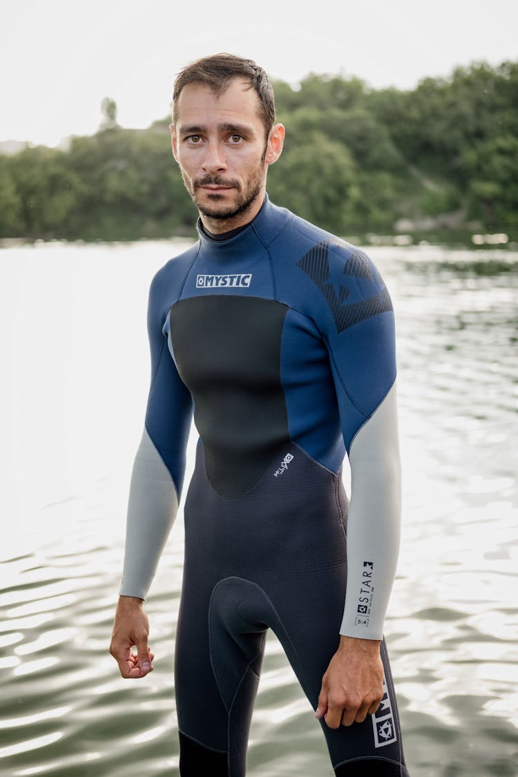 A Man Wearing A Full Body Rash Guard