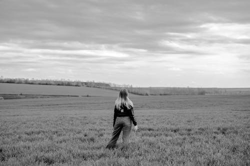 Woman Standing on the Field