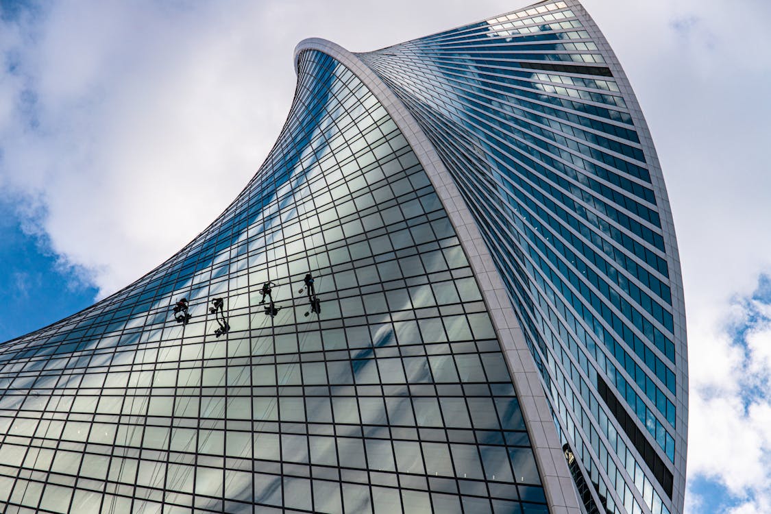 Professional Window Cleaners Cleaning the Evolution Tower