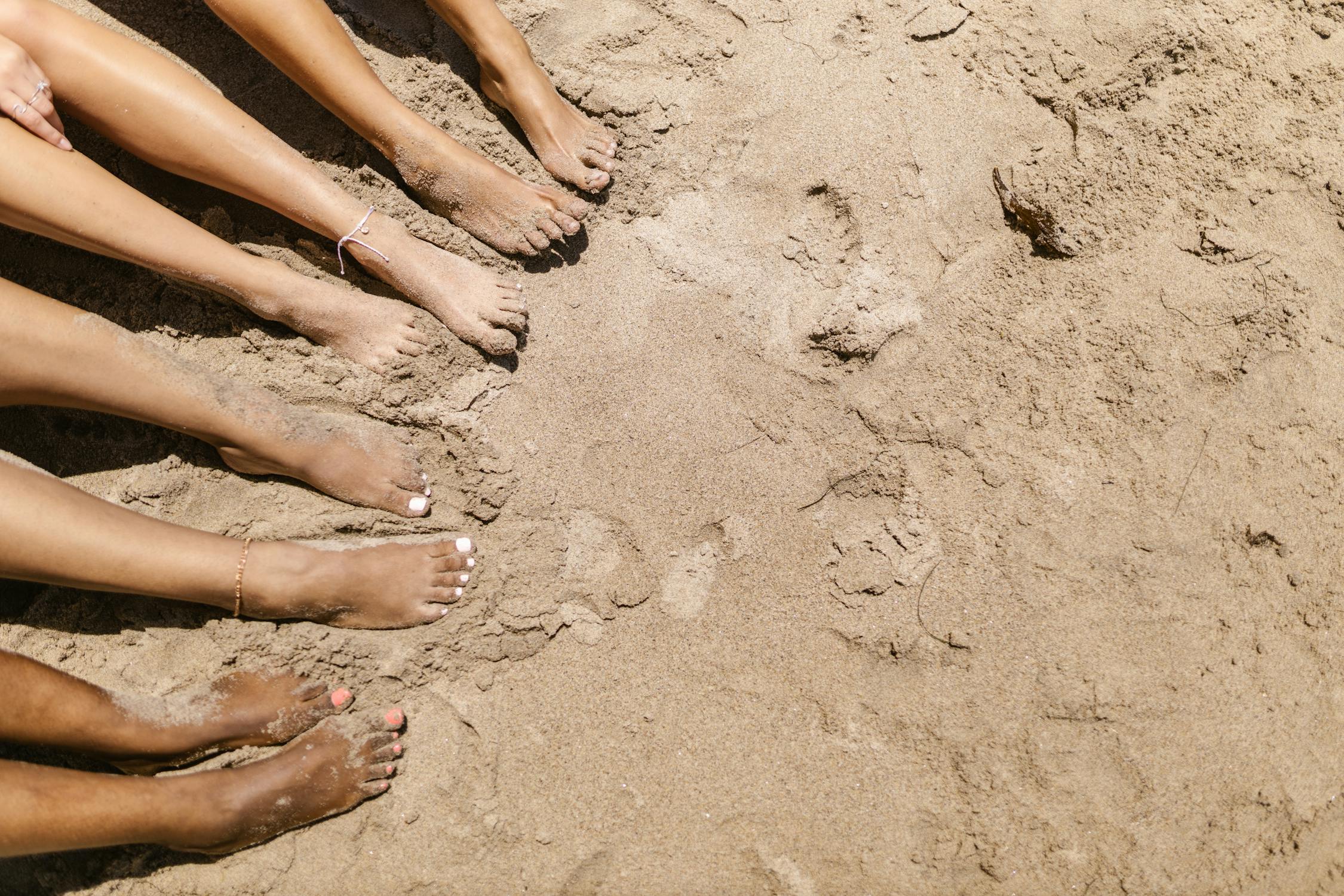 Person Standing on Brown Sand · Free Stock Photo