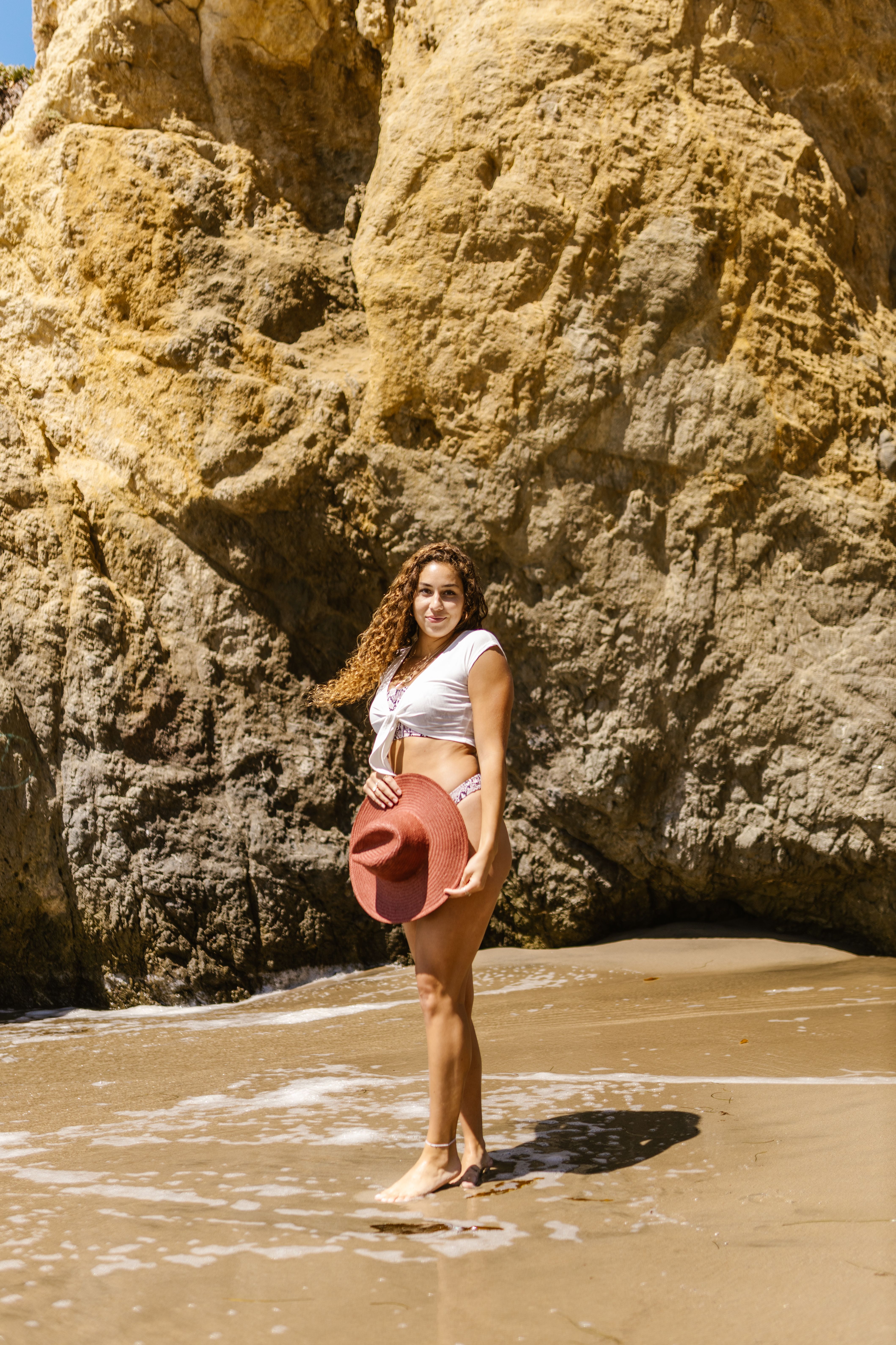 Woman in Bikini Standing at the Beach · Free Stock Photo