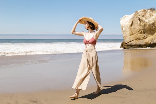 Woman Walking on the Beach