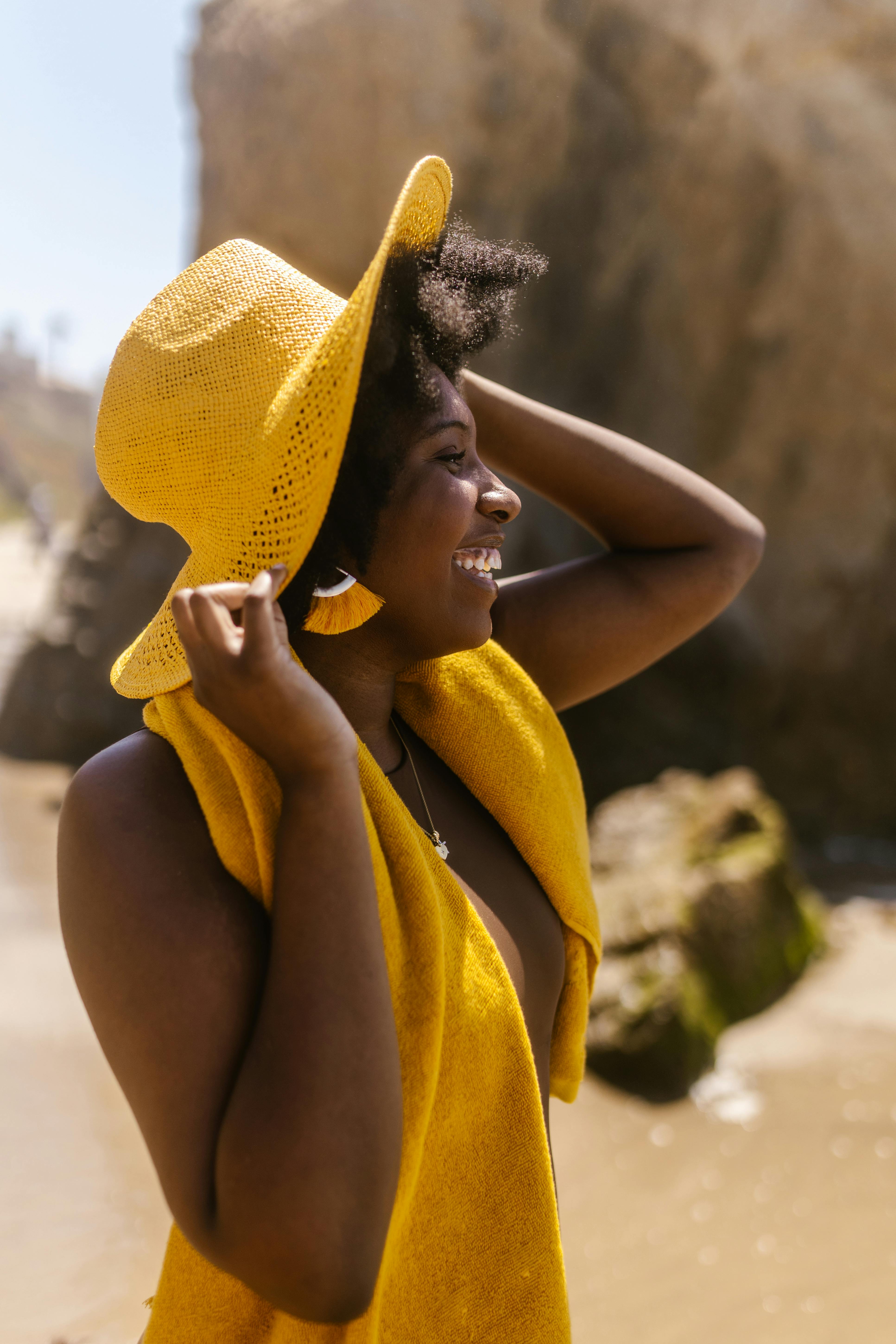 Free Side Profile of Woman in Swimwear Smiling Stock Photo